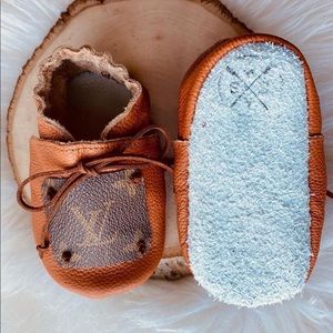 Authentic Louis Vuitton patch leather moccasins.
